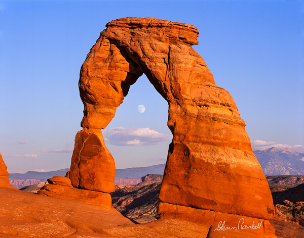 Full moon through Delicate Arch, Arches National Park, Utah